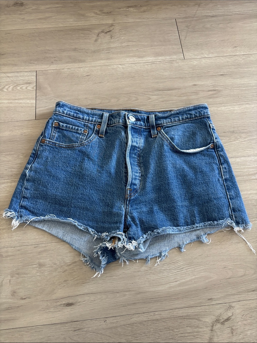 Levi High-Waist Distressed Denim Shorts in Blue